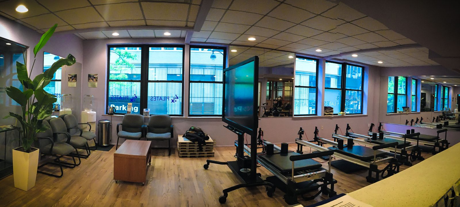 Natural light across the IM=X Pilates studio floor in Midtown Manhattan