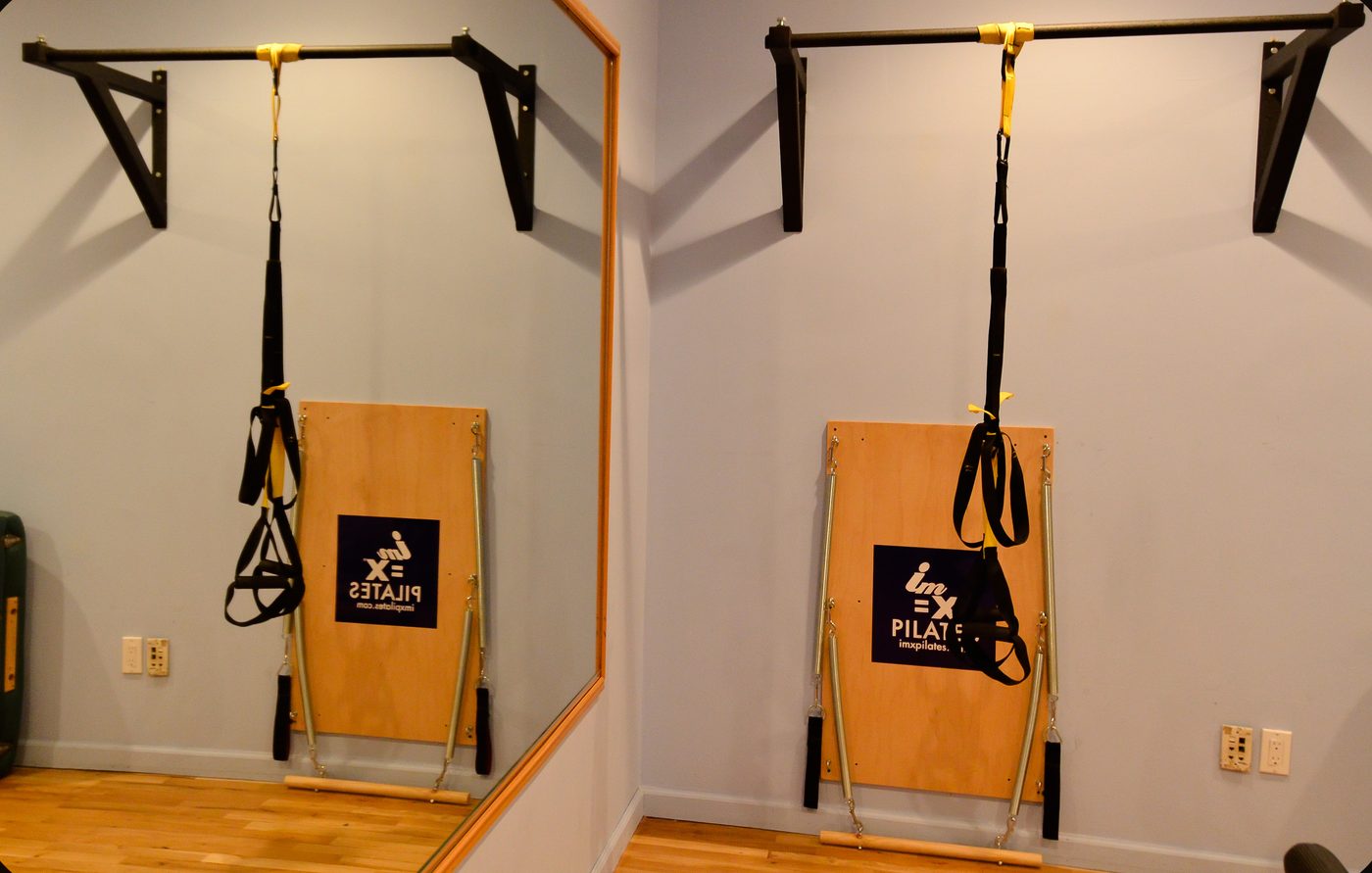 Suspension training straps in the IM=X Pilates studio at Manhattan Spine Rehabilitation